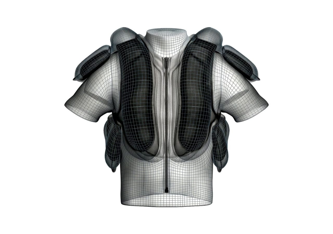 Protective sports gear with black padding on a white wireframe torso.